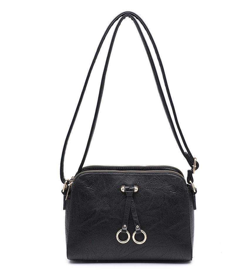 Black textured shoulder bag with a top zipper, double hanging loops with gold-tone rings, and a thin shoulder strap, shown on a plain white background.