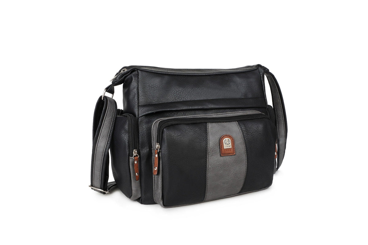 A black and gray faux leather messenger bag with multiple zippered pockets and a brown leather brand patch, shown on a white background.