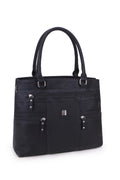 A black faux-leather tote bag with dual top handles, multiple front zippered pockets, and silver-tone hardware, shown against a plain white background.