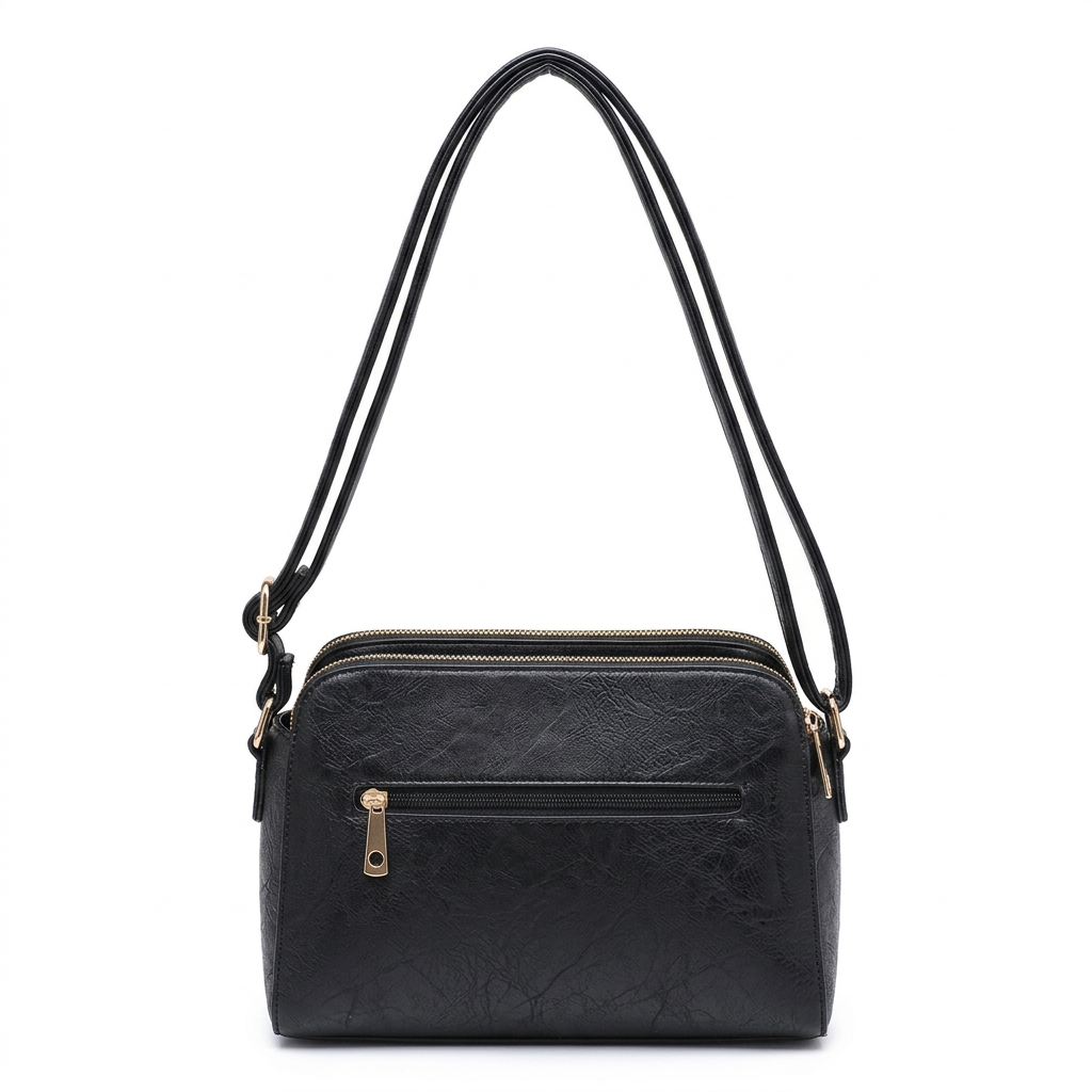 Black shoulder bag with a double zipper top, a front zippered pocket, and a gold-tone zipper pull, shown on a plain white background.