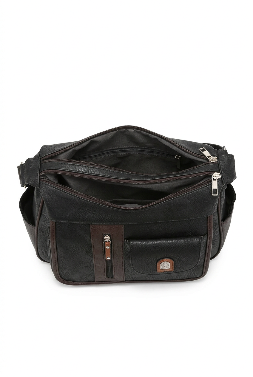 A black faux leather crossbody bag with multiple zippered compartments and a front pocket, shown open against a plain white background.