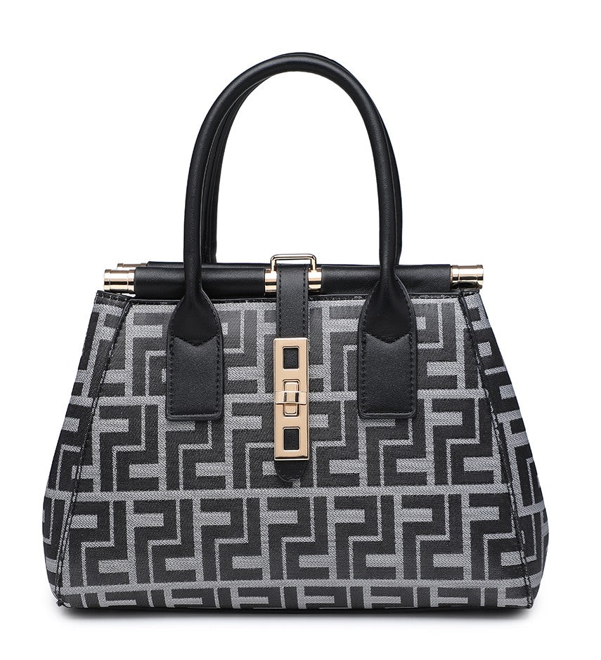 A structured handbag with a black and gray geometric monogram pattern, black handles and trim, and gold-tone hardware, shown on a plain white background.