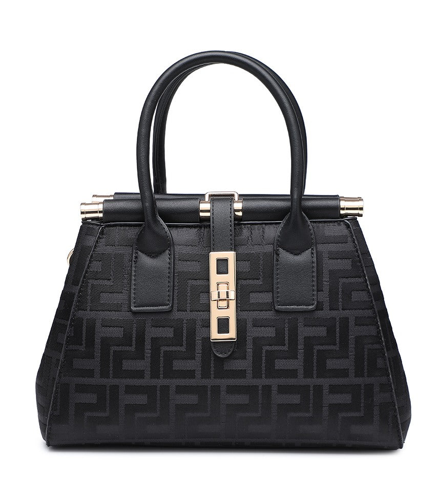 A black structured handbag with a repeating monogram pattern, dual top handles, and gold-tone hardware on a plain white background.