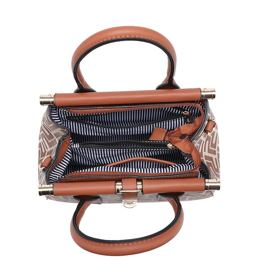 An open structured handbag with tan handles and trim, a patterned beige and brown exterior, and a navy-and-white striped interior lining, shown on a plain white background.