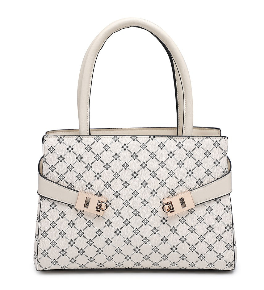 A structured handbag with a cream and white geometric monogram pattern, featuring a matching top handle, a wrap-around strap with gold-tone hardware, and a clean white background.