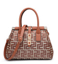 A structured handbag with a brown and beige geometric patterned body, tan handles and trim, and gold-tone hardware, shown on a plain white background.